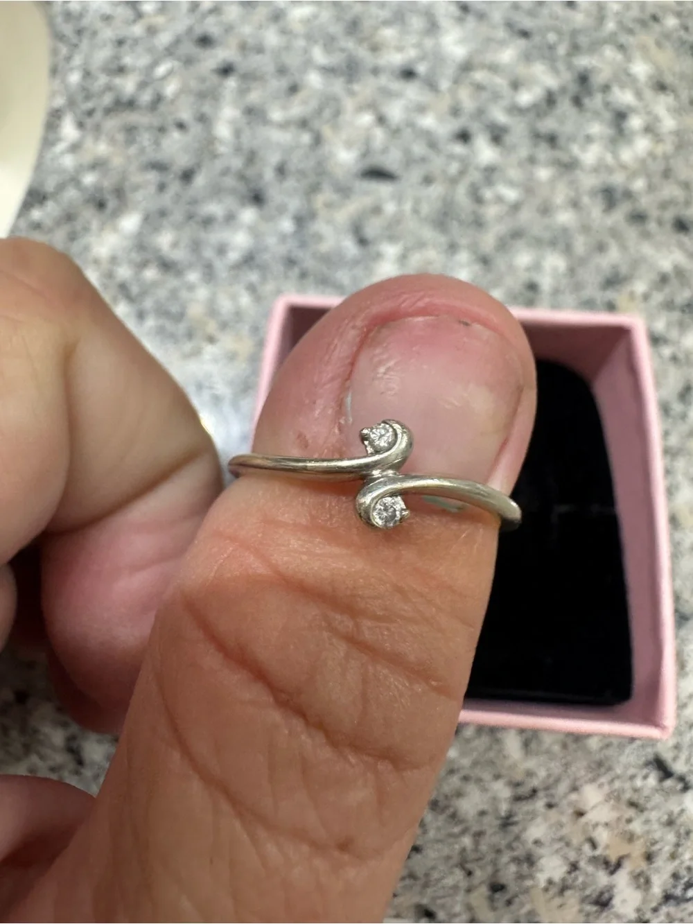 Elegant 10kt Silver Twist Diamond ring